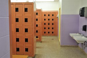 View of fresh-painted orange lockers.