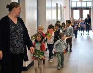 kindergarteners with their books on parade 