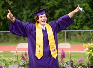 A WVHS student celebrates during graduation.